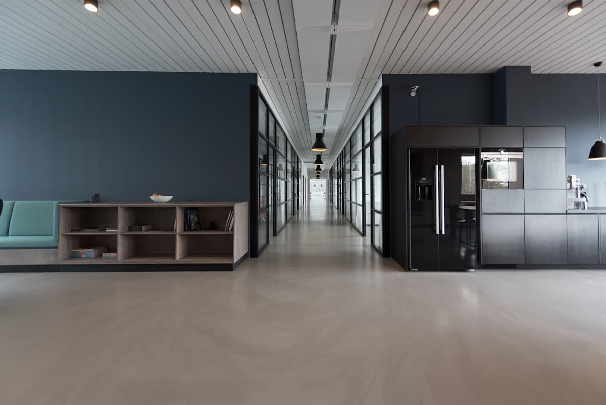 Modern office interior with deep blue feature walls